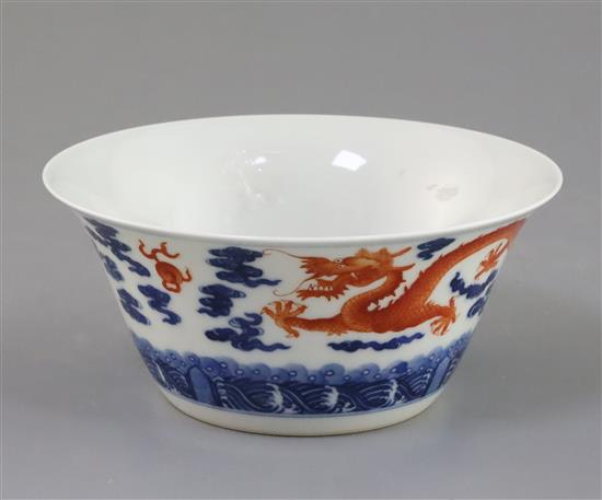 An Chinese iron red and underglaze blue dragon bowl D. 15.5cm